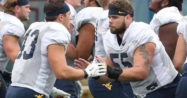 WVU football: Mountaineers 'still learning,' but Rodriguez 'not panicking'
