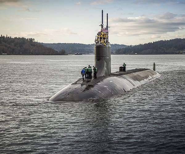 Trump deploys nuclear submarines in row with Russia