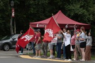 Welcome back, Cougs! WSUV interim chancellor, others wave flags at campus to greet students as new year begins Subscriber Exclusive