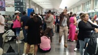 Filas de pasajeros en AICM solicitan reposición de viaje