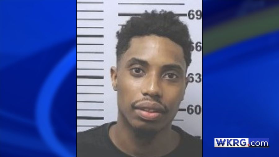 Mobile man accused of throwing object at police car