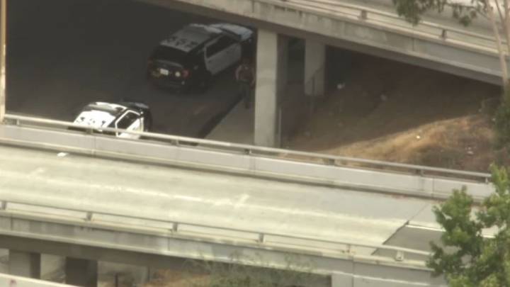 Pursuit ends under East LA freeway overpass after driver goes off road