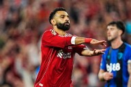 Late goals, Jota tributes and racism claim as Liverpool wins Premier League opener