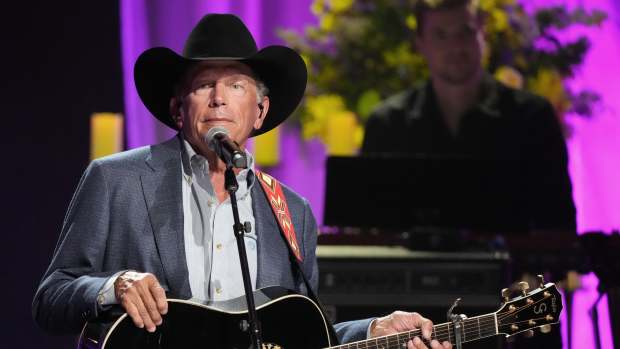George Strait Makes Surprise Appearance for Charity Event