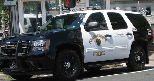 Female pedestrian injured when driver backs up