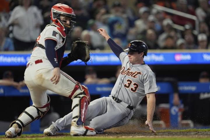 Keith scores on sacrifice fly in 11th, Tigers rally to top Twins 4