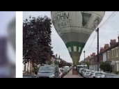Hot air balloon makes emergency landing in middle of UK neighborhood