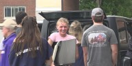 UMaine waves a hearty Maine hello to students on move