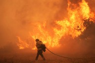 Scientists give harsh grades to Trump administration work aimed at undoing a key climate finding