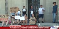People line up to protest NDCS partnership with ICE