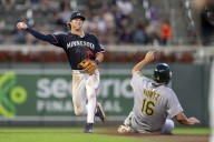 Shea Langeliers extends homer tear, lifts A's over Twins in 10