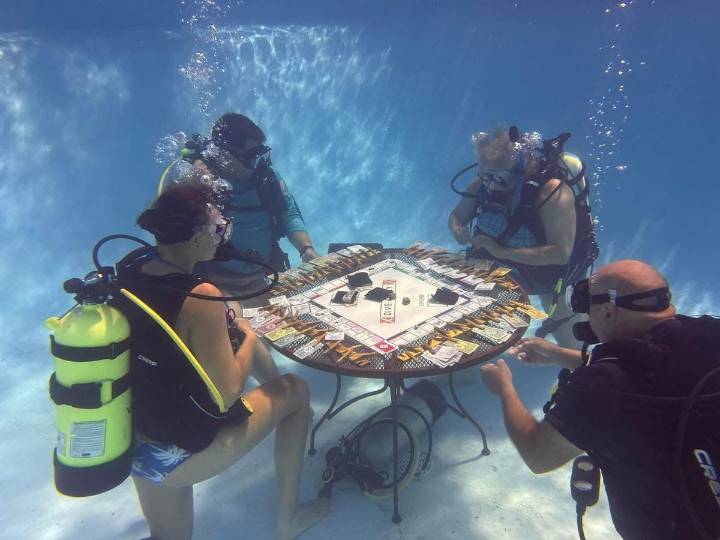 Local Divers Play Underwater 'Monopoly' For Charity