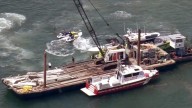 Family of sailboat-barge crash survivor files lawsuit against barge and sailboat operators