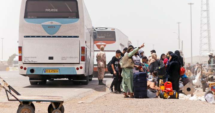 Bus crash kills more than 70 Afghans deported from Iran, including 17 children