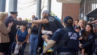 Corey Fisher, of Long Island, NYPD detective shot in Queens, released from hospital