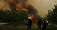 At least 3 dead and thousands displaced as wildfires rage across southern Europe