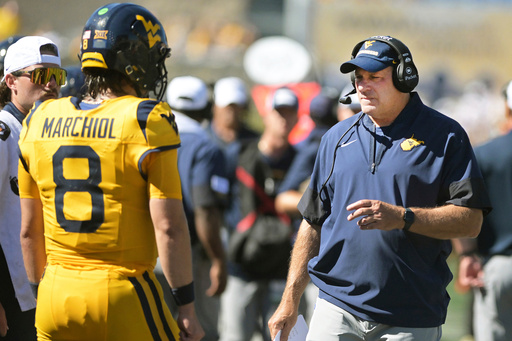 Marchiol and White shine, West Virginia beats Robert Morris 45-3 in Rich Rodriguez's coaching return