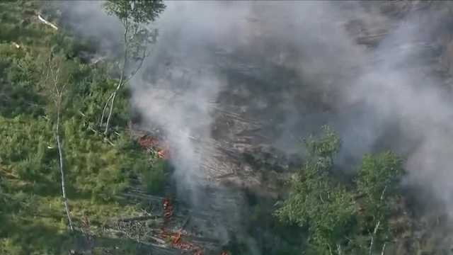 Crews continue to battle brush fire in North Hampton