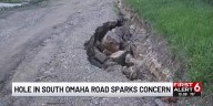 Unpaved roads leave big holes in South Omaha