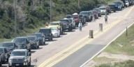 Long lines stretch at North Carolina ferry terminals as Hurricane Erin prompts evacuation orders