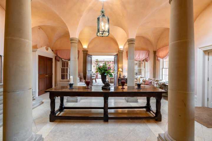 'One of the finest houses in Cheshire' blends Georgian architecture, modern exoticism and space to park your helicopter