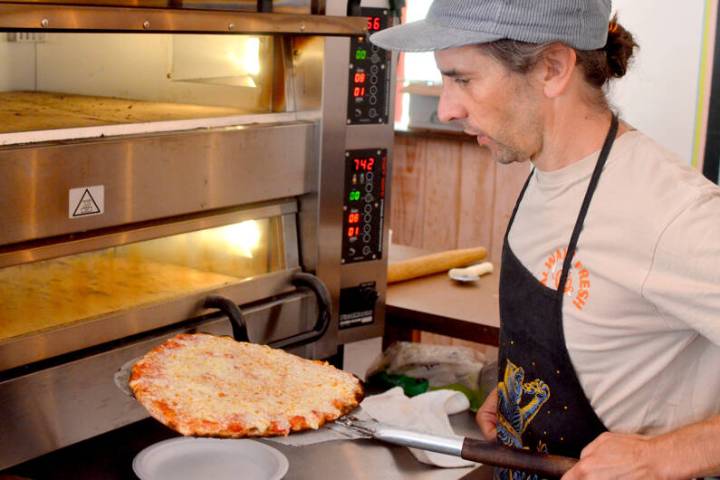 Pizza restaurant reopens its doors