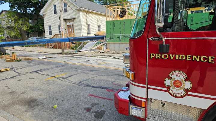 Crane falls across street in Providence