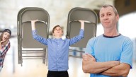Proud Father Teaches Son How To Stack Chairs In Front Of Youth Group Girls