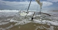 Sailboat remains stranded on beach at Cape Hatteras National Seashore