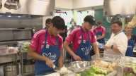 CITY SC players cook up a meal at Ronald McDonald House