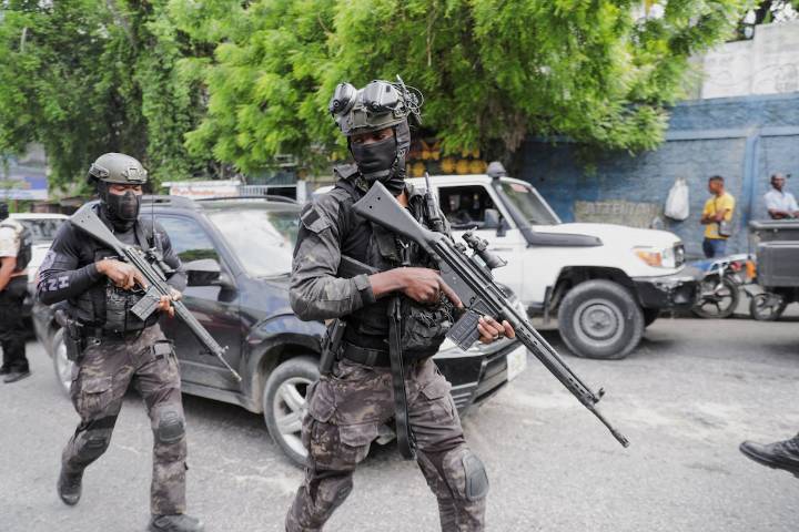 Business leader assumes Haiti presidency as gangs vow to topple government