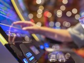 Slots gambler at centre of $1M fight between BC lottery and FINTRAC