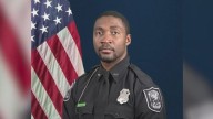 Officer, gunman killed in shooting near CDC