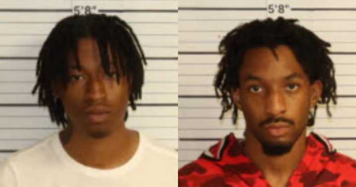 Two arrested for bringing guns to U of M campus