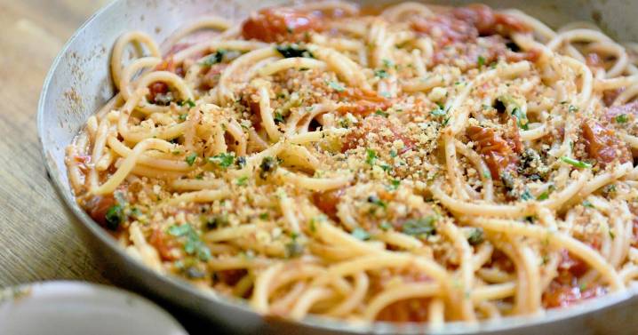 Bucatini with burst cherry tomatoes and fried caper crumbs offers ample flavor