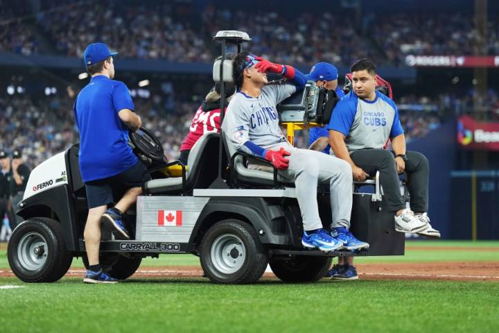 Cubs catcher Miguel Amaya carted off after injuring left ankle stepping on first base
