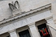 Fed expected to stick with regular-sized rate cut after hot inflation data