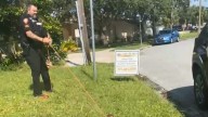 3-legged gator heads back to water with help from Melbourne officer