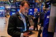 Most US stocks fall after a disappointing inflation update, but Big Tech keeps Wall Street steady