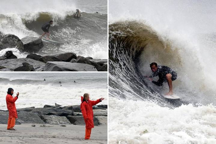 Surfers catch huge waves on Rockaway Beach from Hurricane Erin 