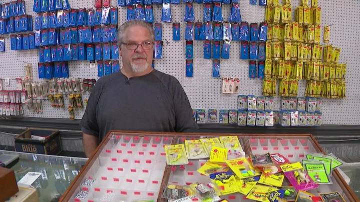 Bait-and-tackle shop, contents being auctioned off