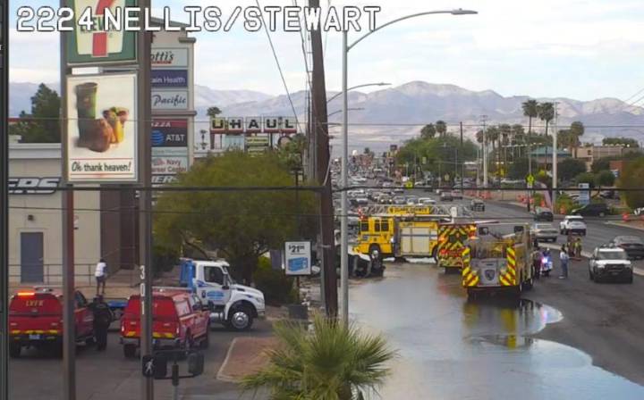 Vehicle crashes into Las Vegas water main, closes lanes