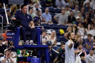 Medvedev's US Open match delayed by booing fans after photographer enters the court