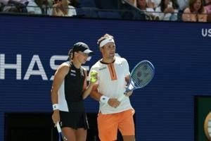 Weary Swiatek wins US Open mixed doubles opener