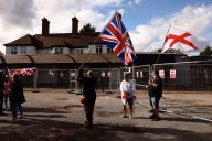 Asylum-seekers can remain in UK hotel after government wins appeal to keep it open