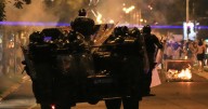Police chase anti-government protesters in Serbia as president pledges crackdown