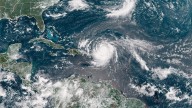 Erin Downgraded, Remains Powerful Hurricane