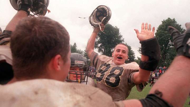 Triumphs and tender moments: Photos capture 50 years of McQuaid football history