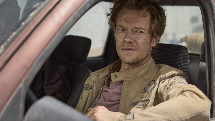 Alfie Allen looks bored throughout the toe