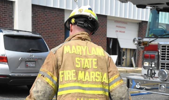 Salisbury woman charged with arson after dispute over $7